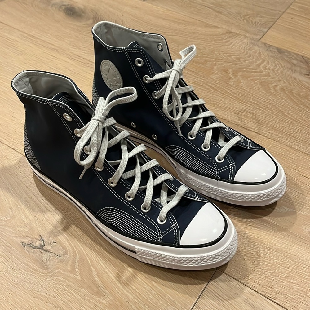 Brand new, blue Converse chuck taylor high tops, men’s size 11
